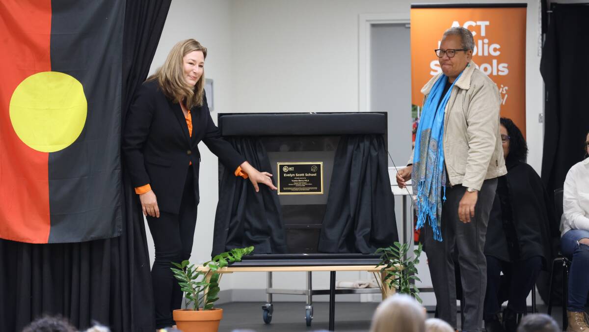 Education Minister Yvette Berry and Charmaene Scott unveil a plaque to commemorate the naming of Evelyn Scott School. Picture: James Croucher