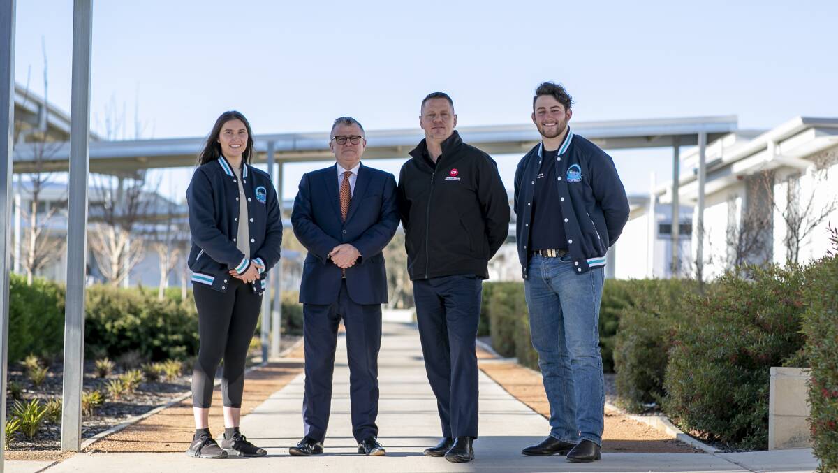 St Mary MacKillop College captains Lilly Vassallo and Zac Cunningham settle into Canberra Park with Principal Michael Lee and Canberra Park general manager David Grigg. Picture: Keegan Carroll