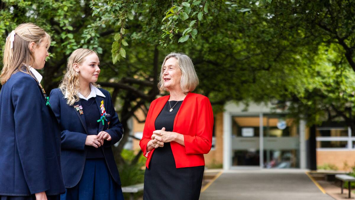 Merici College students Freya Spring and Amy Stubbs with principal Anna Masters. Picture: supplied