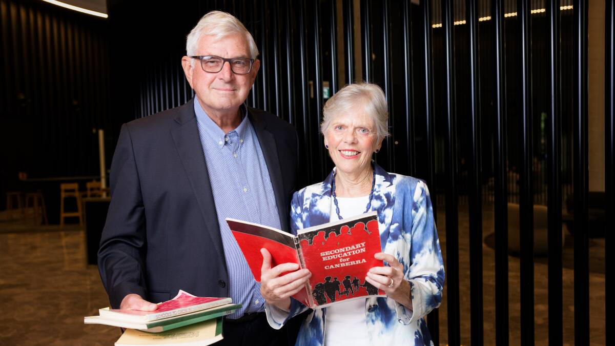 Mal Lee and Helen Strauch helped design the ACT's secondary school system when it separated from NSW in the 1970s. Picture by Sitthixay Ditthavong