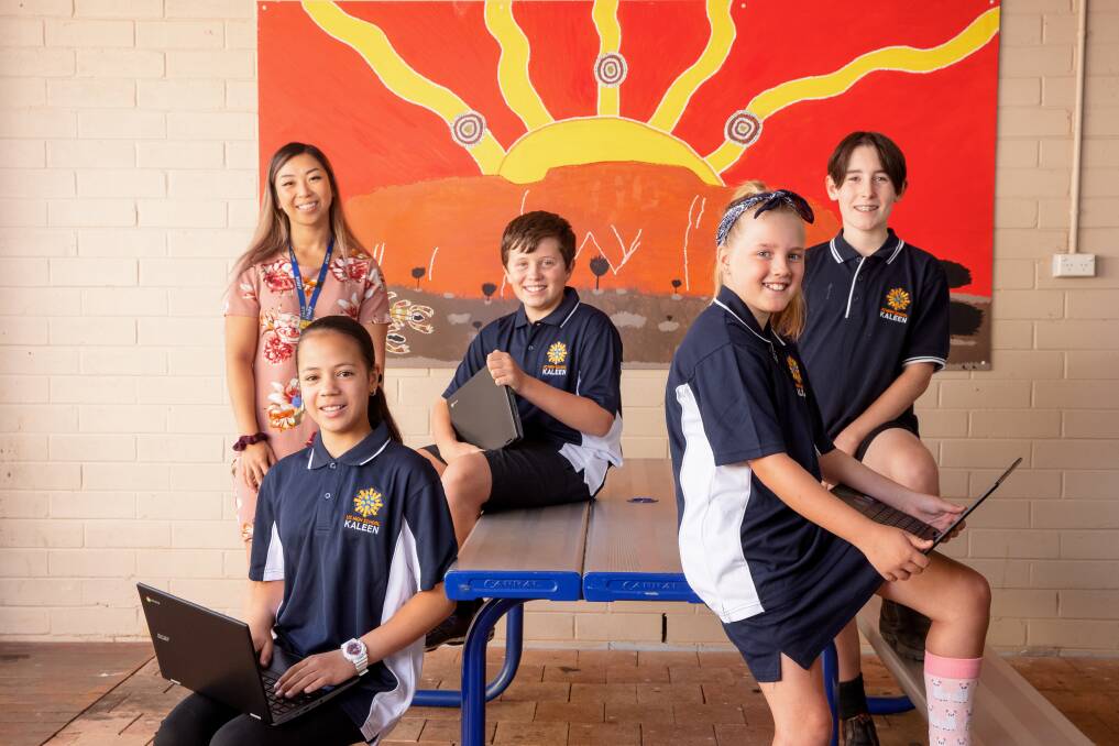 University of Canberra High School Kaleen maths teacher Wendy Ting Chen with Year 7 students Arielle Moses, Bailey Jones, Isabella Constance, and Huon White. Picture: Sitthixay Ditthavong