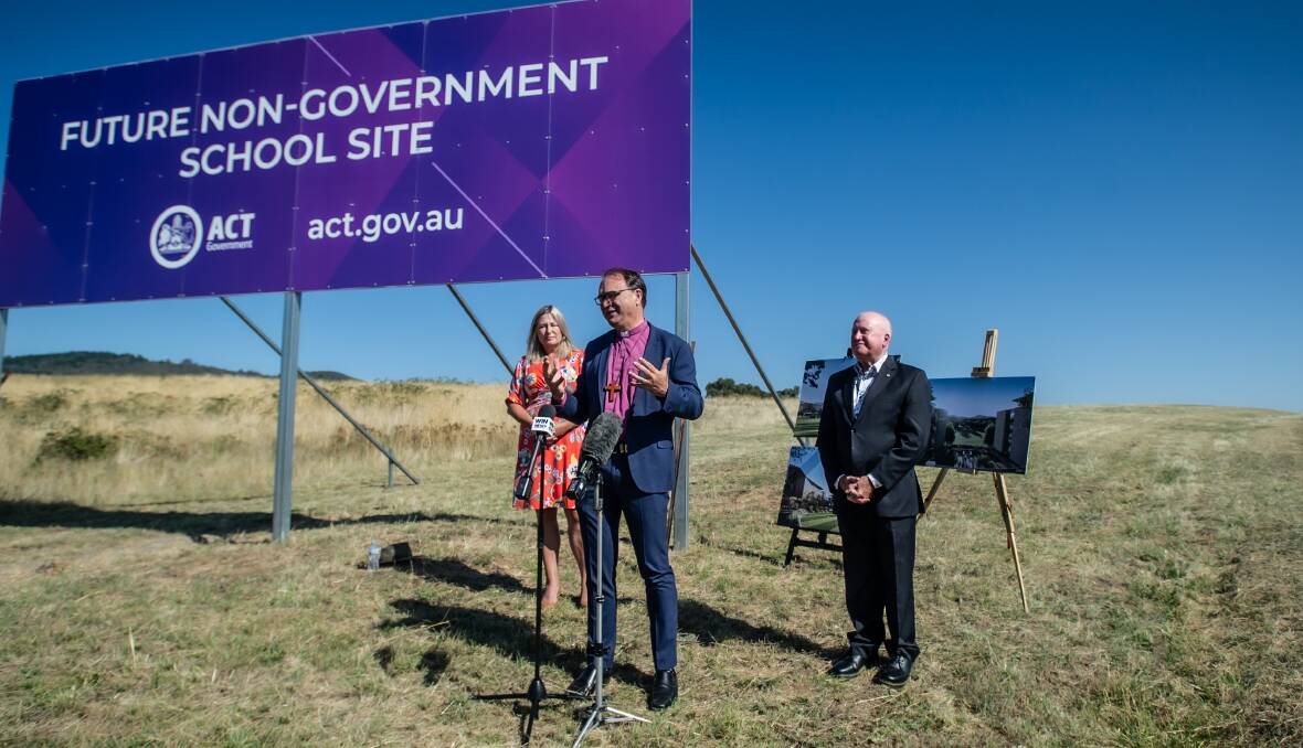 Bishop Mark Short with Education Minister Yvette Berry and Planning Minister Mick Gentleman on the site of the new Stromlo Forest Anglican School. Picture by Karleen Minney