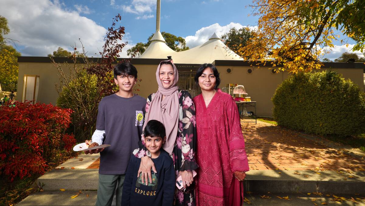 Raamiz, 12, Rohaan, 5, Maryam and Mishaal Hassan, 17, celebrate the end of Ramadan at Canberra Mosque on Sunday. Picture by Sitthixay Ditthavong