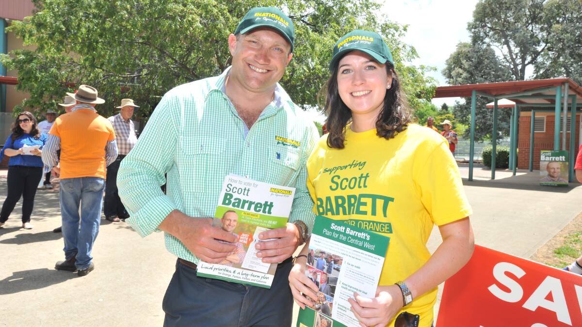 IN FRONT: Nationals candidate for the seat of Orange Scott Barrett and supporter Phillipa Noakes on Saturday. Photo: JUDE KEOGH