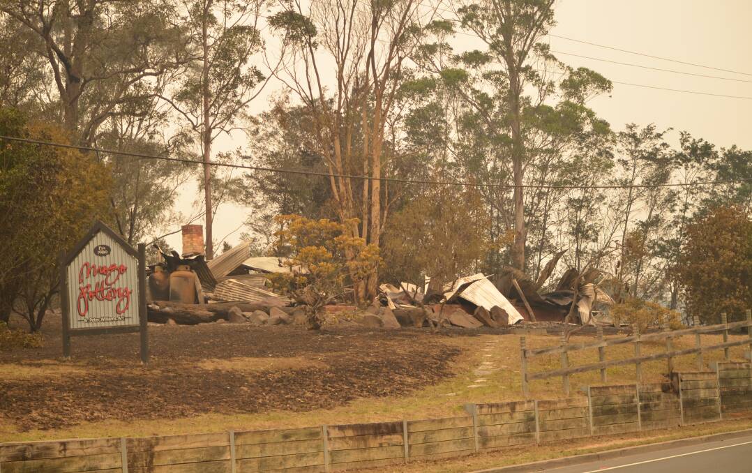 The devastating scene at Mogo Pottery after the bushfire swept through the town on New Year's Eve 2019. Picture: Andrea Cantle