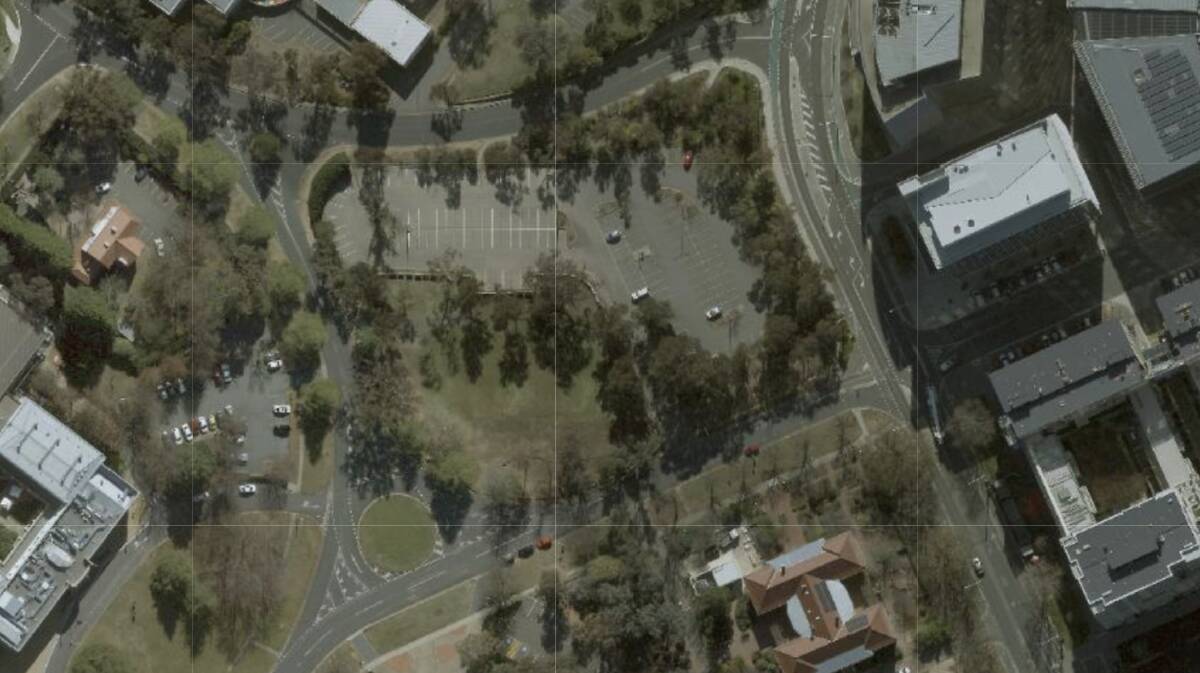 An aerial photograph of the block purchased by the Australian National University, centre, which has largely served as a carpark. Picture ACTMapi