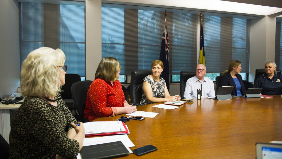 ACT government ministers meet in the cabinet room at the Legislative Assembly with officials on January 2, 2020 during the bushfire smoke crisis. Picture: Dion Georgopoulos 