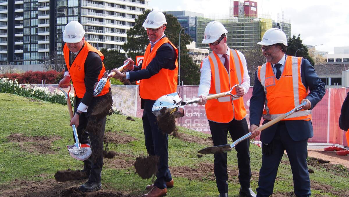 Major Projects Canberra head Duncan Edghill, Chief Minister Andrew Barr, Transport Minister Chris Steel and Abergeldie Contractors chief executive Mark Bruzzone at a sod-turning ceremony to mark the project's start on Monday. Picture by Jasper Lindell