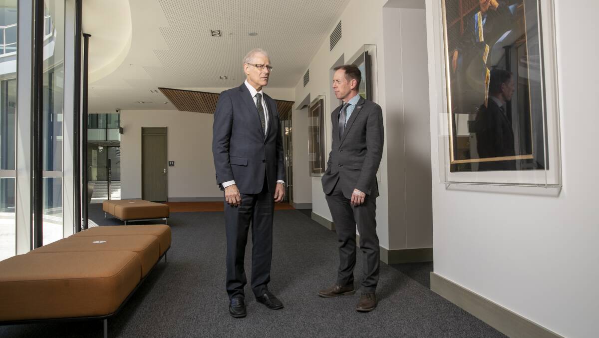 Acting Justice Richard Refshauge, left, and Attorney-General Shane Rattenbury, pictured at the ACT Supreme Court in December 2021. Picture by Sitthixay Ditthavong