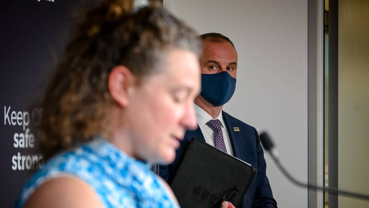Chief Minister Andrew Barr looks on as chief health officer Dr Kerryn Coleman addresses a press conference on Friday. Picture: Elesa Kurtz