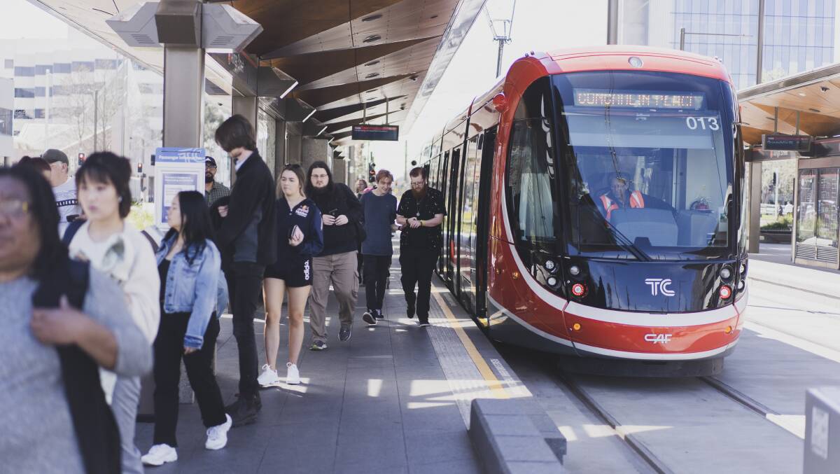Passengers catch light rail into the city, from where the line is to be extended to Commonwealth Park. Picture: Dion Georgopoulos