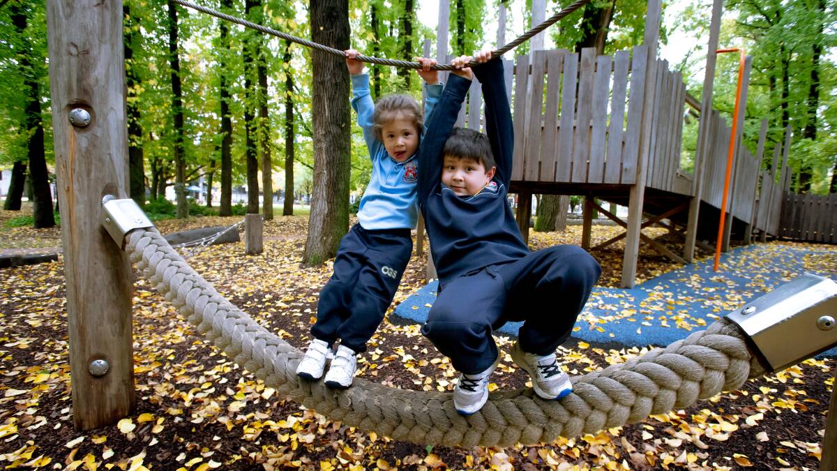 Isabella Harding, 3, left, and brother Ben, 5, from Carwoola play at the Glebe Park playground on Friday. Picture: Elesa Kurtz