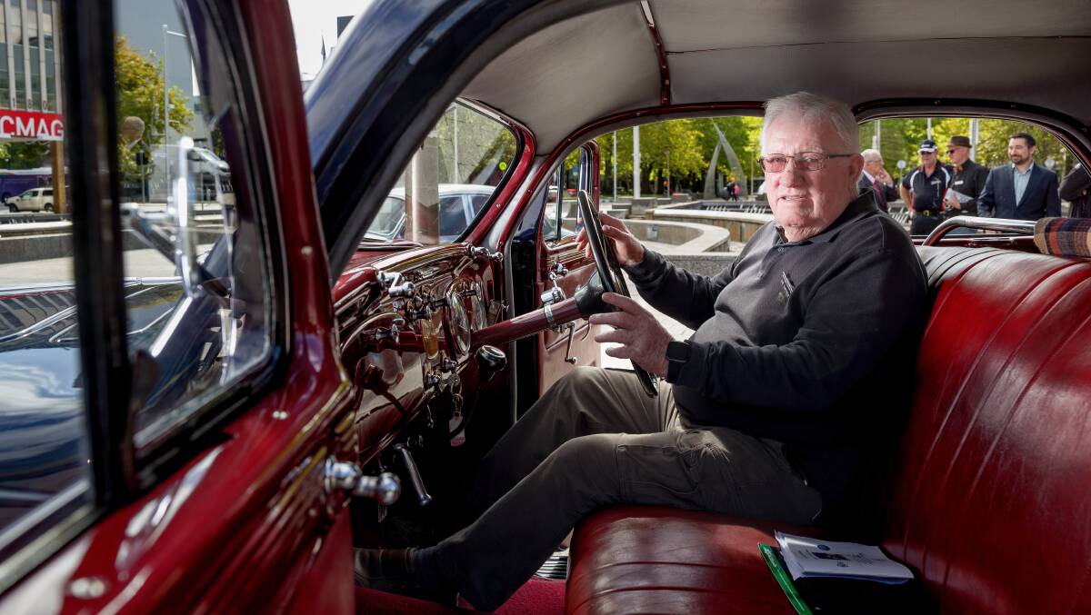 Lee Gaynor of Calwell behind the wheel of his 1934 DeSoto Airflow in Civic Square, welcoming registration changes. Picture by Sitthixay Ditthavong