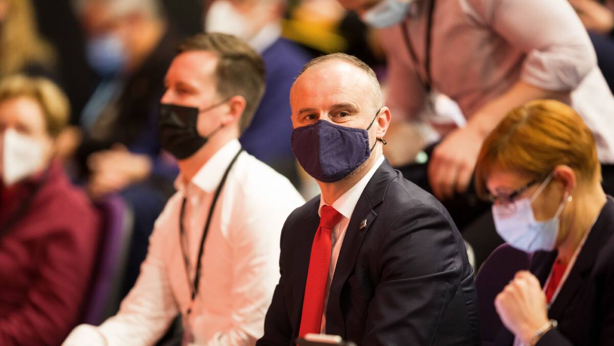 Chief Minister Andrew Barr, centre, at the ACT Labor conference on Saturday between Health Minister Rachel Stephen-Smith, right, and Transport Minister Chris Steel.