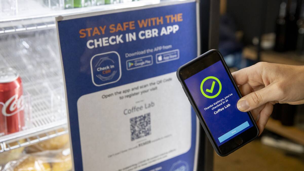 Canberrans are still expected to use the Check In CBR app despite health authorities winding back publishing COVID-19 exposure sites. Picture: Sitthixay Ditthavong