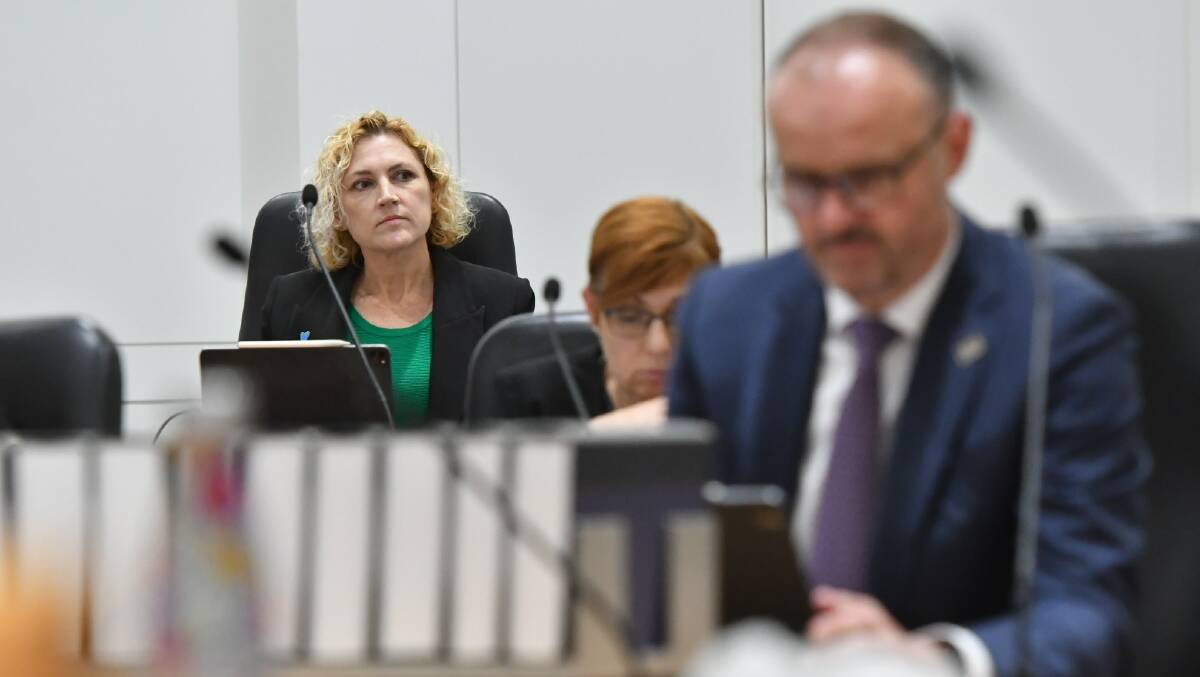 Mental Health Minister Emma Davidson, left, behind Chief Minister Andrew Barr, front right, in the Legislative Assembly on Tuesday. Picture by Elesa Kurtz