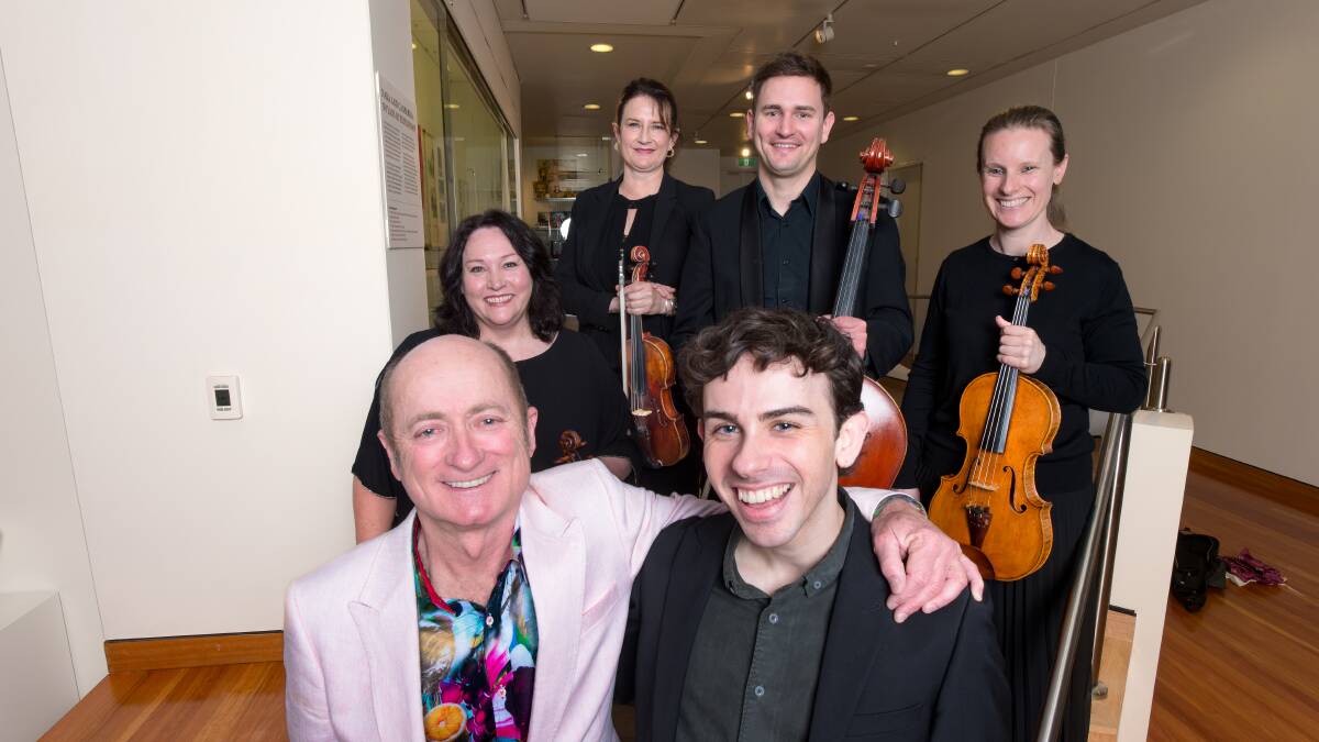 The Hoodoo Gurus' Dave Faulkner and composer Alex Turley, with the Canberra Symphony Orchestra's Doreen Cumming, Kirsten Williams, Samuel Payne, and Lucy Carrigy-Ryan. Picture by Sitthixay Ditthavong