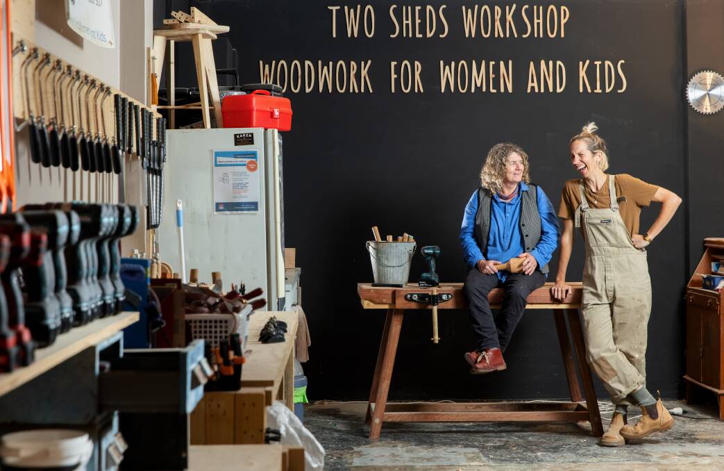 Jo Saccomani and former Canberra United player Sally Jean Davis at the Wanniassa Two Sheds workshop. Picture: Sitthixay Ditthavong
