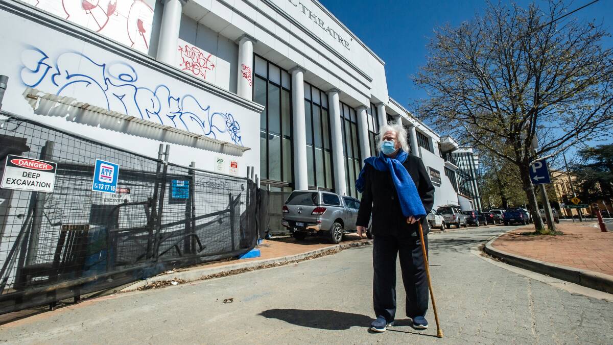 Mrs Liangis stands on the Canberra Avenue side of the existing Capitol Cinema building, where should be required to build an entry in a conditionally approved hotel. Picture: Karleen Minney