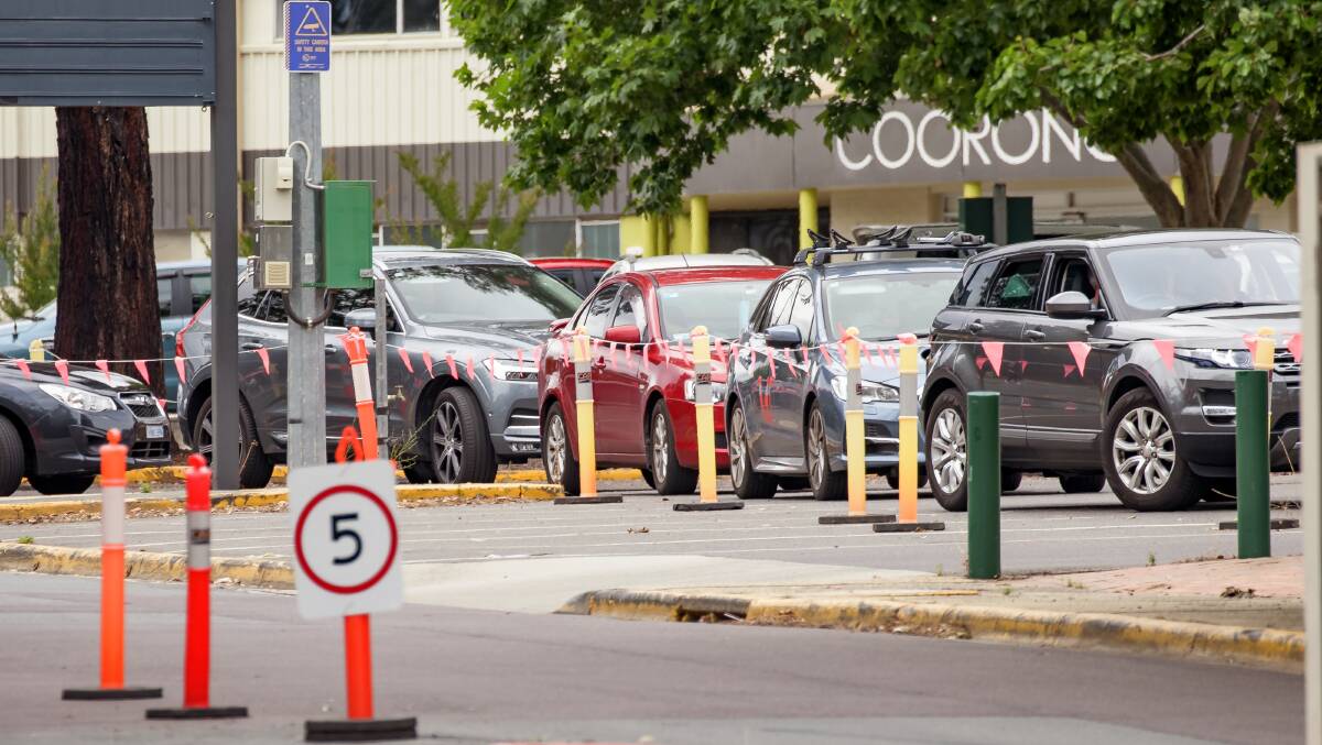 Cars line up for COVID-19 testing at Exhibition Park in Canberra during a surge in demand. Picture: Sitthixay Ditthavong