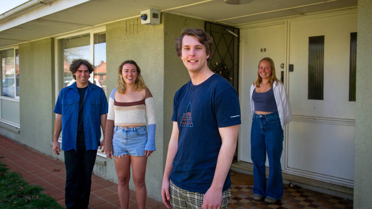 Milan Leonard, front, a data scientist and ANU student, crunched the numbers on supermarket exposure times to help out housemates Zac Taylor, Xanthe Murrell and Sam Holt. Picture: Elesa Kurtz
