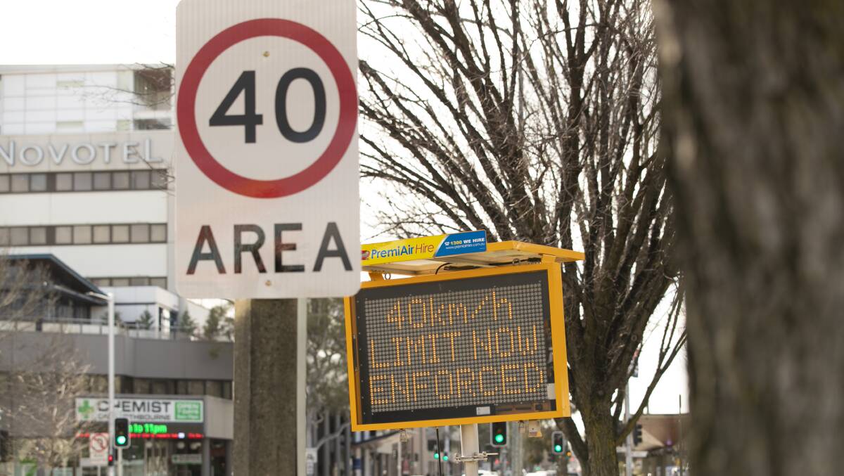 Signs on Northbourne Avenue warn motorists of new 40km/h speed zones. Picture: Keegan Carroll