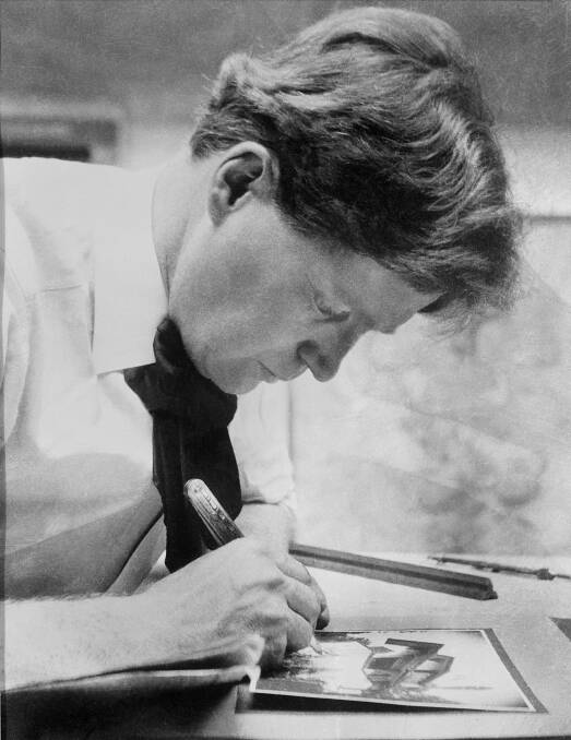 Walter Burley Griffin at work. Picture: National Archives of Australia A1200, L32618