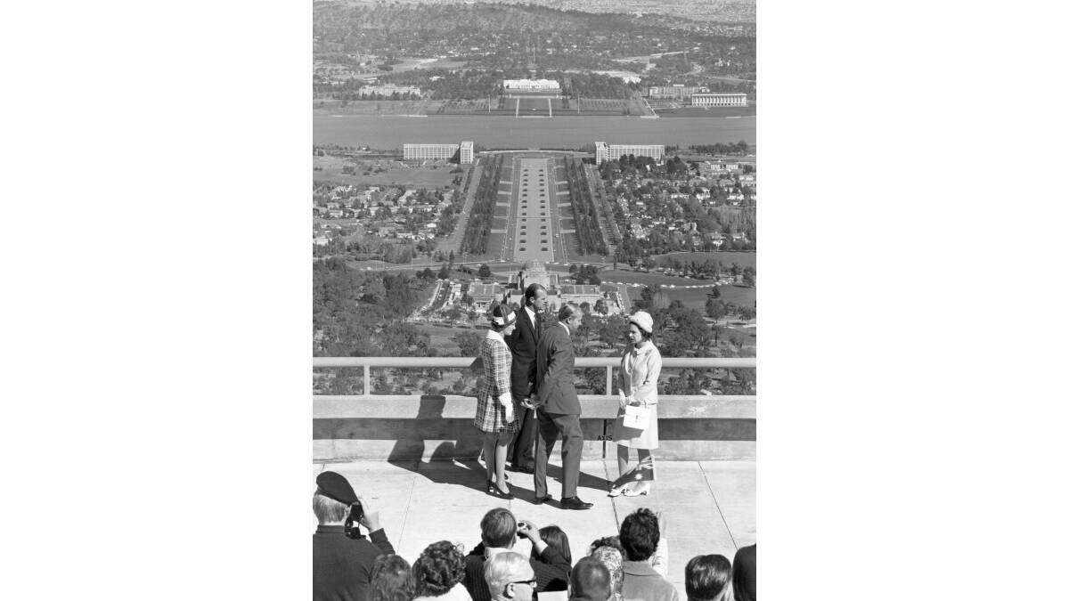Queen Elizabeth and Prince Philip view Canberra from the summit of Mt Ainslie in May 1970. Picture Libraries ACT