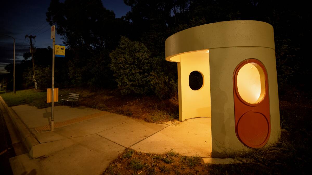 An illuminated bunker-style concrete bus shelter in Mitchell. Picture: Sitthixay Ditthavong