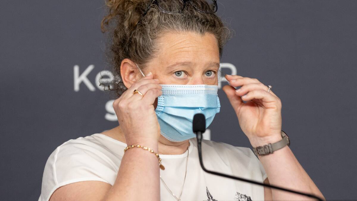 ACT chief health officer Dr Kerryn Coleman removes her mask before addressing the media on Tuesday. Picture: Sitthixay Ditthavong