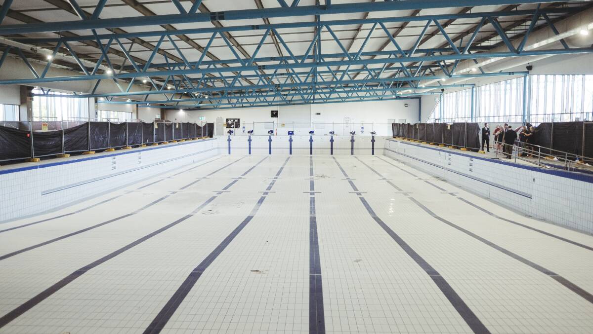 The draiined 50-metre pool at Gungahlin Leisure Centre in March 2021, which is due to reopen in August. Picture: Dion Georgopoulos 