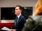 Transport Minister Chris Steel delivers the ACT government's response to the Blake Corney coronial inquest recommendations in the Legislative Assembly. Picture: Elesa Kurtz