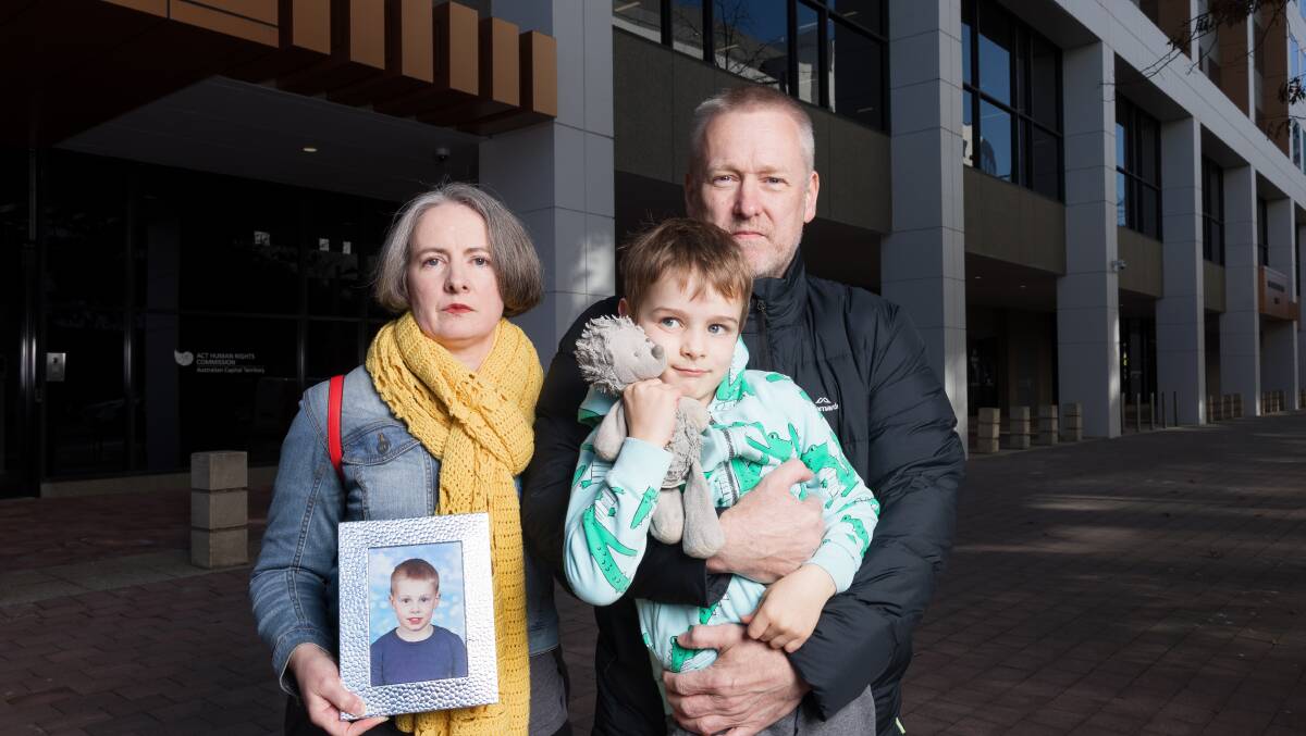 Camille Jago, Aidan Corney, 6, and Andrew Corney, family members of road accident victim Blake Corney in July 2022. Picture by Sitthixay Ditthavong