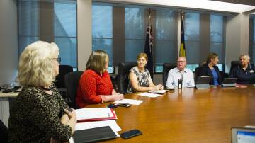 Ministers and officials meet in the ACT's cabinet room in January 2020, amid the bushfire smoke crisis. Picture: Dion Georgopoulos