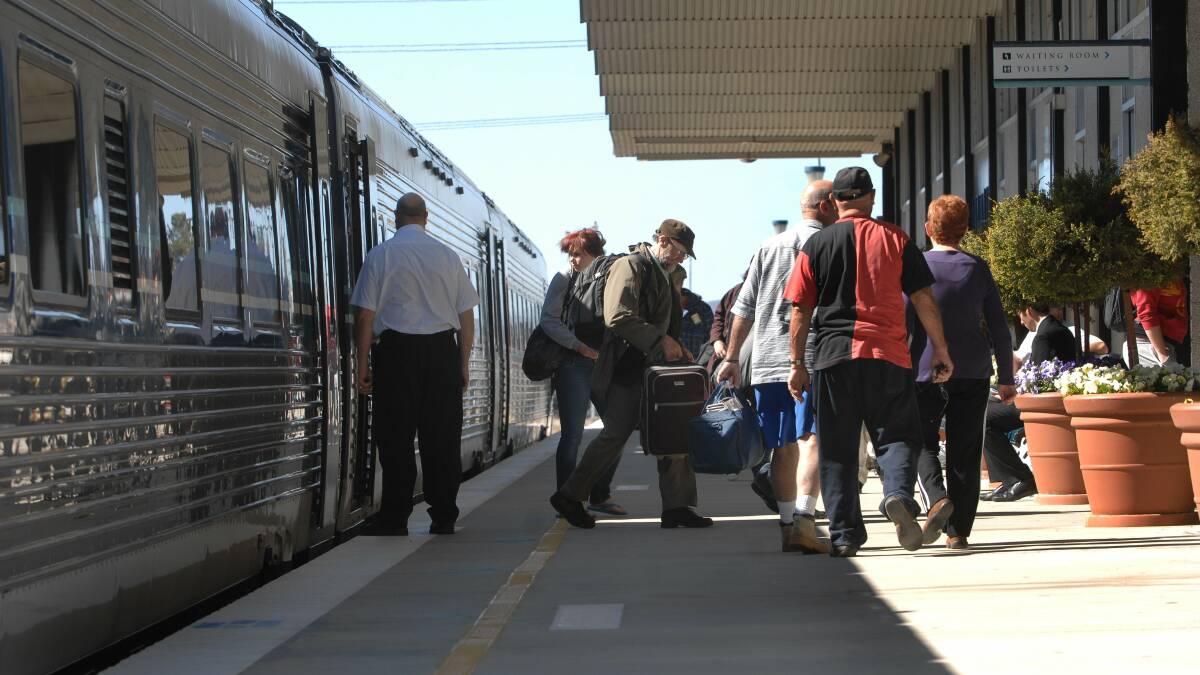 Passengers at Canberra Station in Fyshwick, whence the train to Sydney takes four hours. Picture by Graham Tidy