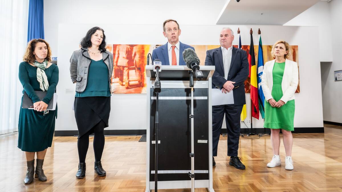 Greens leader Shane Rattenbury, centre, addresses allegations against Johnathan Davis on Monday, flanked, from left, by Rebecca Vassarotti, Jo Clay, Andrew Braddock and Emma Davidson. Picture by Karleen Minney