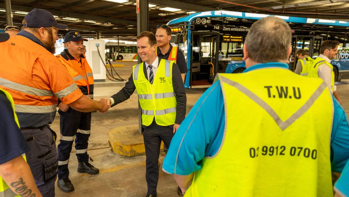 Mr Steel greets union officials and staff at the Belconnen depot in October. Picture by Gary Ramage
