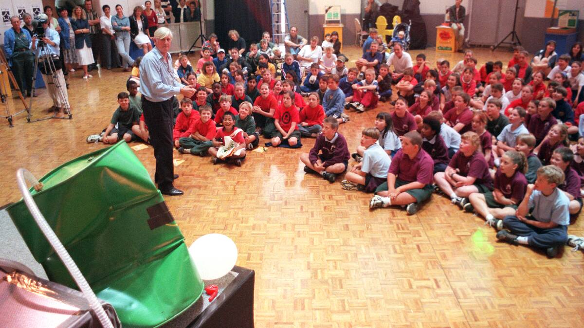 Professor Gore gives a demonstration to a group of Canberra school children on November 23, 1998 to mark Questacon's 10th birthday. Picture: Peter Wells