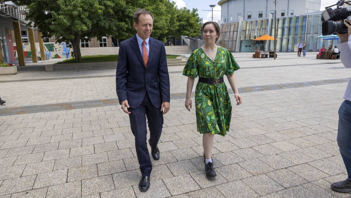 Greens leader Shane Rattenbury, left, with Laura Nuttall outside the Legislative Assembly on Monday. Picture by Gary Ramage