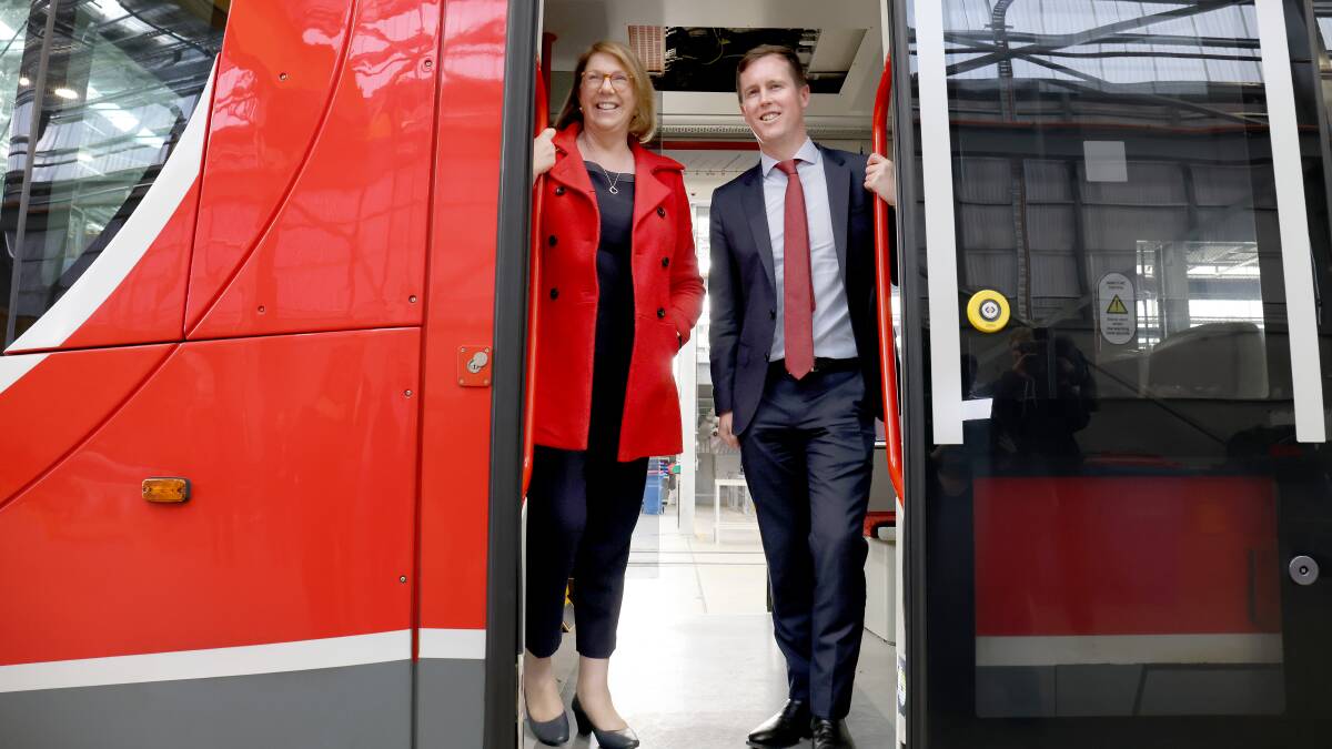 Federal Infrastructure Minister Catherine King, left, with ACT Transport Minister Chris Steel aboard a light rail vehicle at the Mitchell depot on Tuesday. Picture: James Croucher