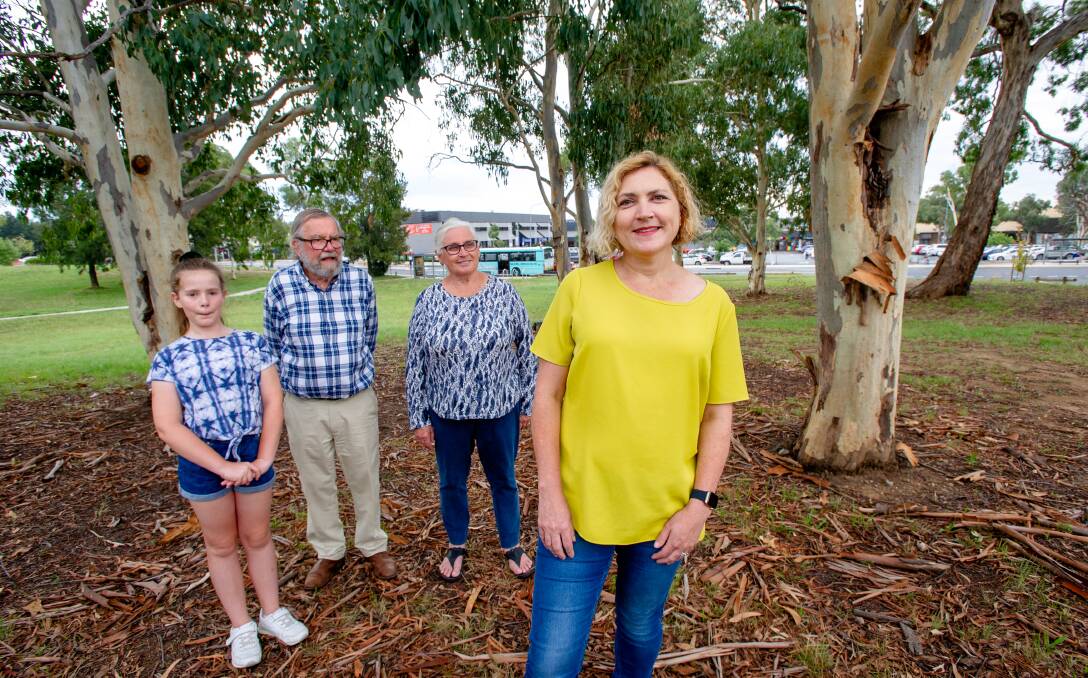 Emma Davidson, with local residents Lilly Forrest, 11, and John and Robyn Davies. Picture: Elesa Kurtz