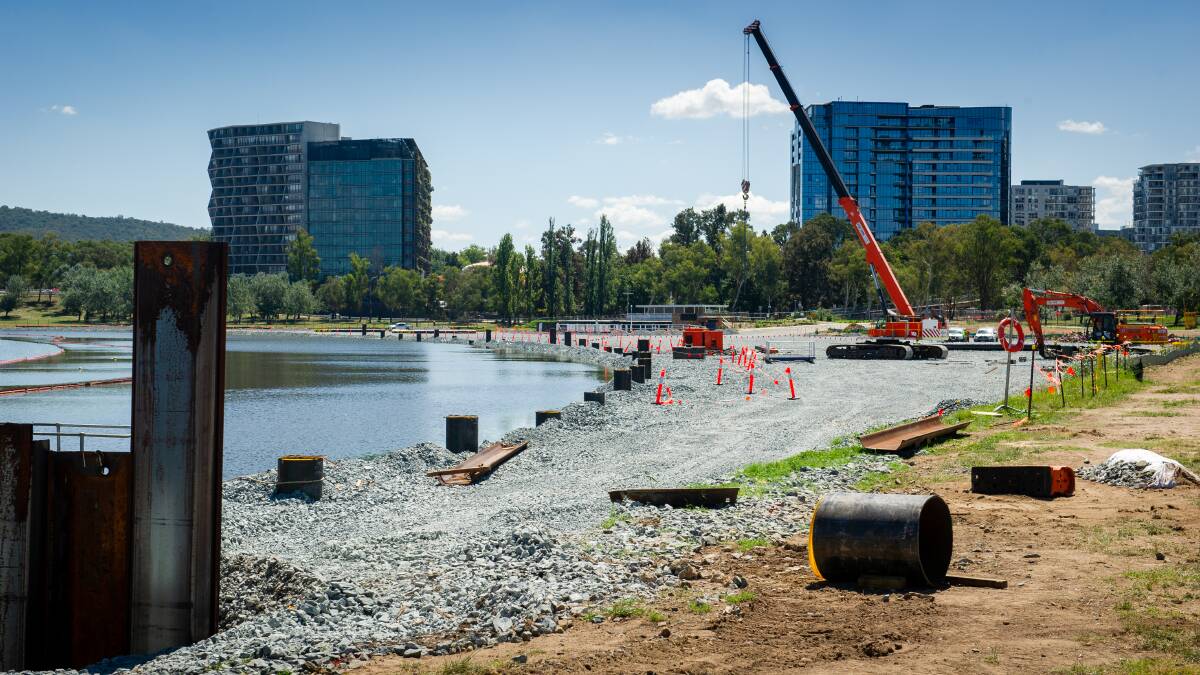 Work to reclaim land from the bed of Lake Burley Griffin at West Basin, which has been the subject of an audit that criticised the government's handling of the contract. Picture by Elesa Kurtz
