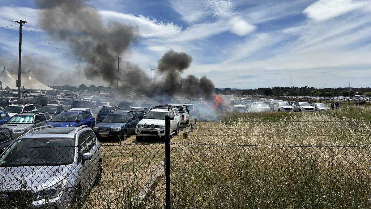 A fire quickly spread between cars in a car park at Exhibition Park on Saturday, where the Spilt Milk outdoor concert was being held. Picture supplied