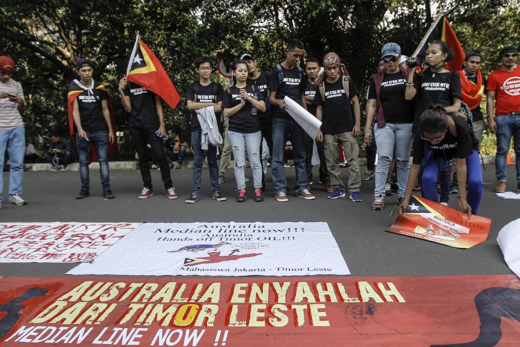 East Timorese students rally in front of the Australian embassy in 2016 in Jakarta, Indonesia. Protesters demanded Australia come to the table "in good faith" to end a long-running dispute over major oil and gasfields in the Timor Sea. Picture: Barcroft Media via Getty Images