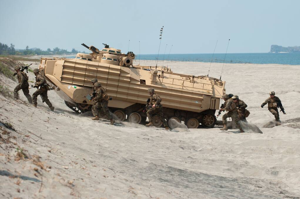 US marines take part in an amphibious assault maneuver during the Balikatan war games exercise in the Philippines in 2015. Balikatan which means 'shoulder to shoulder' is a joint military exercise meant to increase the interoperability effectiveness of US and Philippine troops. Picture: Getty Images
