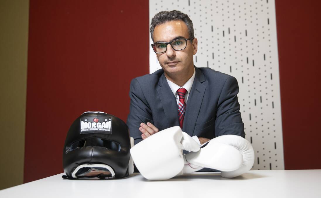 Attorney-General's Department employee and amateur boxer, Yorgos Helios, who volunteered for the public service's surge reserve. Picture: Keegan Carroll