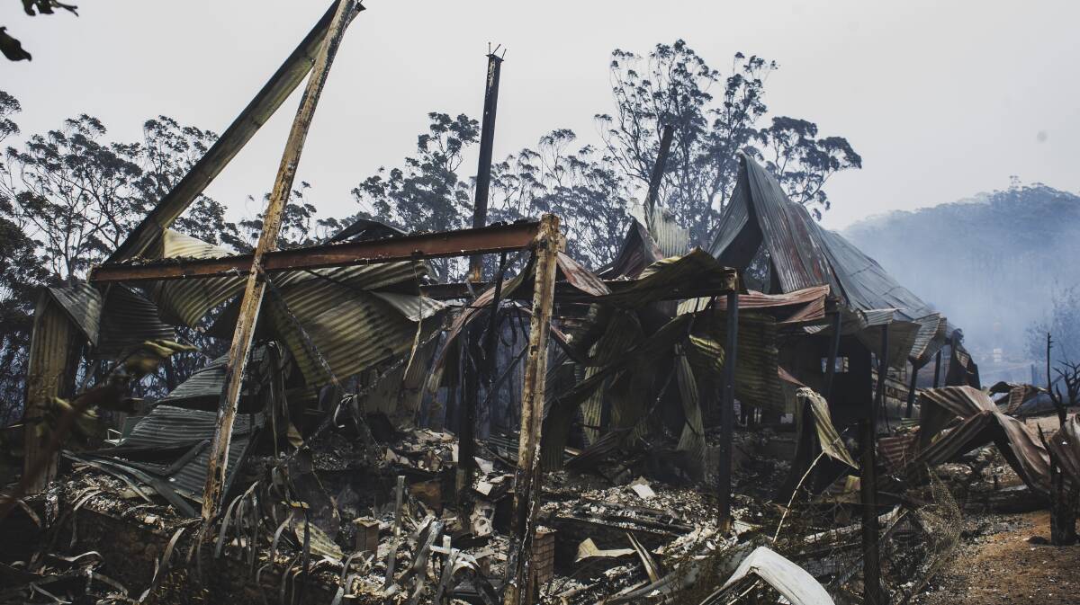 Andrew Phillips' house on December 22, 2019. Fire reduced it to a heap of smouldering ruins. Picture: Dion Georgopoulos