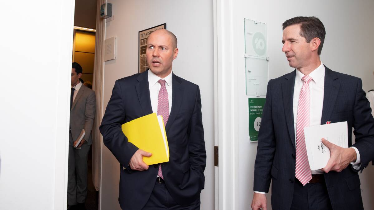 Treasurer Josh Frydenberg and Finance Minister Simon Birmingham at Parliament House in May, on the day they handed down the 2021-22 federal budget. Picture: Sitthixay Ditthavong