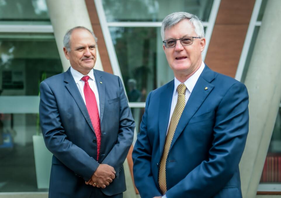 Martin Parkinson (right) is replacing Ken Henry (left) as chair of the Sir Roland Wilson Foundation. Both were senior public servants under Coalition and Labor governments. Picture: Karleen Minney