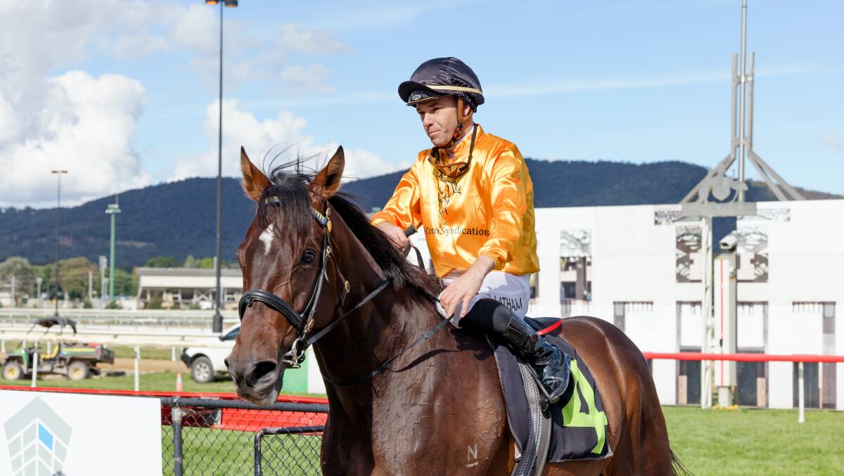 Jockey Keagan Latham returns to scale with Flying Crazy after winning the Canberra Guineas on Monday. Picture: Sitthixay Ditthavong